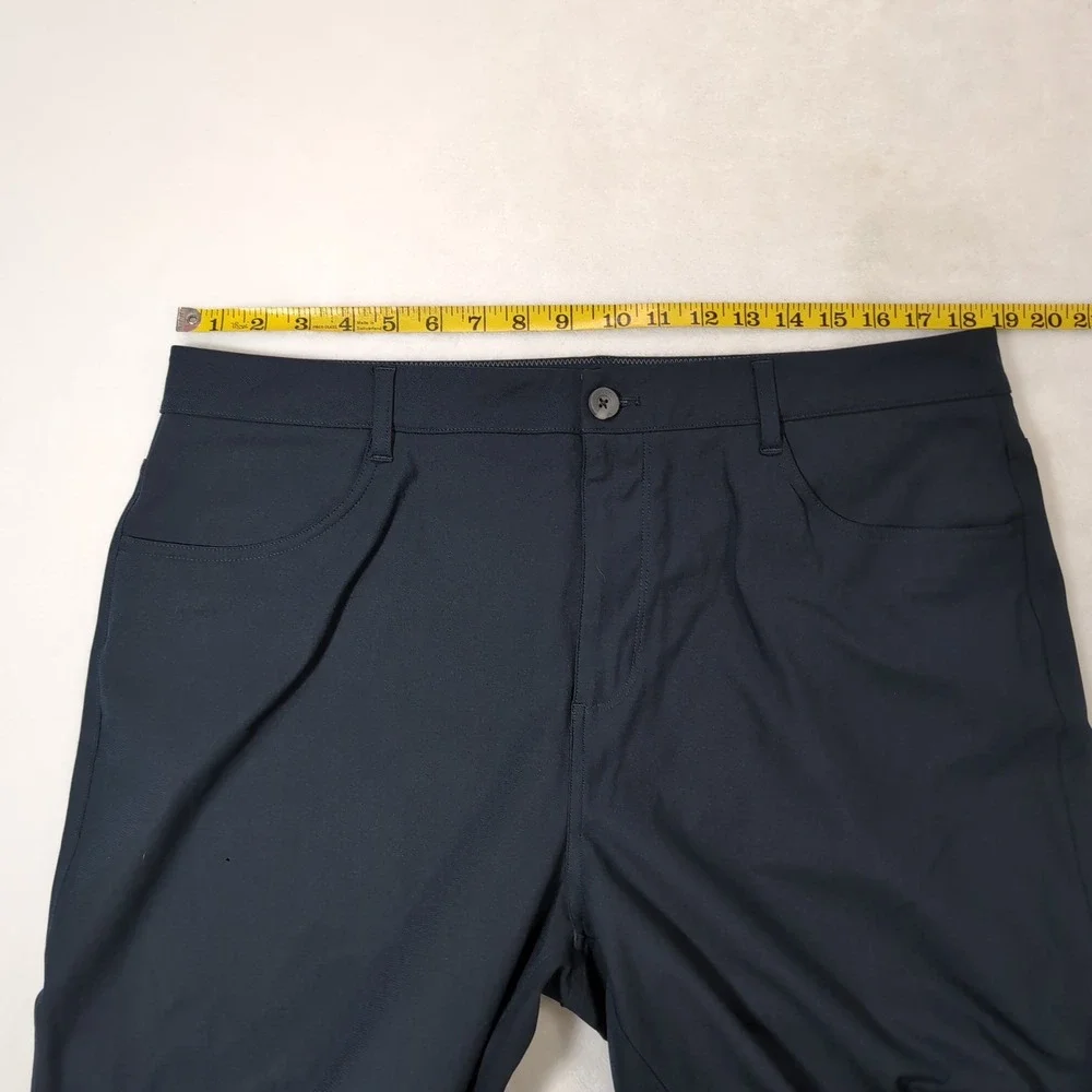Vuori Meta Pant Men 36 Navy Blue Slim Taper 4-Way Stretch Tech V4009 Performance